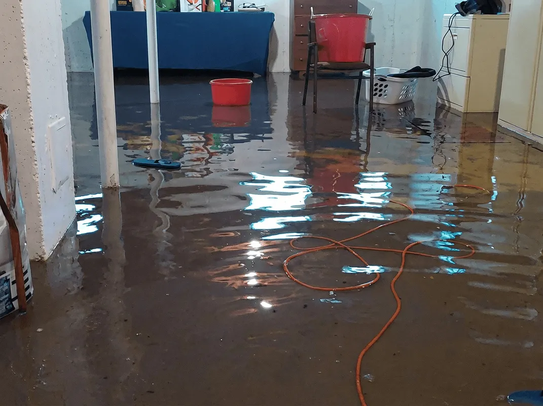Basement with boiler, cabinets and washing machine completely flooded in Erie, PA